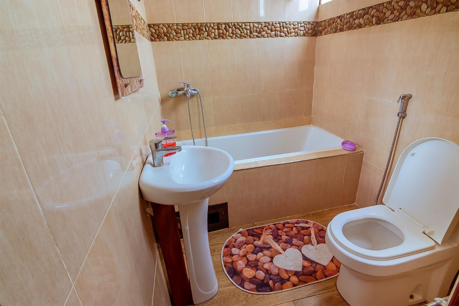 Rayan Apartments & Safaris Arusha Habitación foto